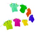 Laundry line with colored t-shirts isolated on a white Royalty Free Stock Photo