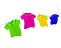 Laundry line with colored t-shirts on a white background Royalty Free Stock Photo