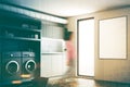 Laundry room, gray washing machines, poster, girl