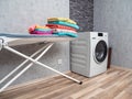 Laundry room interior with washing machine against the wall. Royalty Free Stock Photo