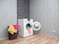 Laundry room interior with washing machine against the wall. Royalty Free Stock Photo