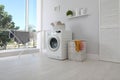 Laundry room interior with washing machine Royalty Free Stock Photo