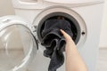 Laundry room interior with washing machine near wall Royalty Free Stock Photo