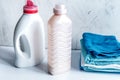 Laundry set with towels and plastic bottels on white background Royalty Free Stock Photo