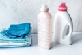 Laundry set with towels and plastic bottels on white background Royalty Free Stock Photo