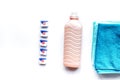 Laundry set with towels and plastic bottels on white background top view Royalty Free Stock Photo