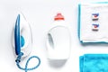 Laundry set with towels and plastic bottels on white background top view Royalty Free Stock Photo