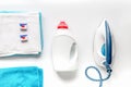 Laundry set with towels and plastic bottels on white background top view Royalty Free Stock Photo