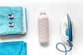 Laundry set with towels and plastic bottels on white background top view Royalty Free Stock Photo