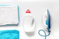 Laundry set with towels and plastic bottels on white background top view Royalty Free Stock Photo