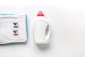 Laundry set with towels and plastic bottels on white background top view mock-up Royalty Free Stock Photo