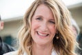 Laura Dern signing autographs on the Promenade des Planches during the 43rd Deauville American Film festival, on August 2, 2017