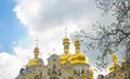 Laura in spring. Golden domes over cloudy sky Royalty Free Stock Photo