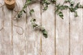 Laurel decor on wood background top view Royalty Free Stock Photo