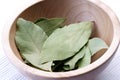 Laurer leafs in wooden bowl Royalty Free Stock Photo