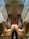 Lausanne, Switzerland - August 20, 2019: View of the main organ inside Notre Dame Cathedral in Lausanne. Church interior. Vertical Royalty Free Stock Photo