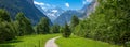 Lauterbrunnen valley with gorgeous waterfall and Swiss Alps