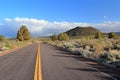 Lava Beds National Monument, Park Road and Hippo Butte Cinder Cone in Evening Light, Northern California, USA Royalty Free Stock Photo