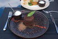 lava cake. Chocolate fondant with basil ganache. Traditional dessert of French cuisine with author\'s filling