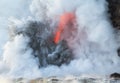 Lava explodes on entry into sea water Royalty Free Stock Photo