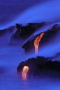 Lava flowing into the sea Royalty Free Stock Photo