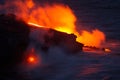 Lava flowing into the sea Royalty Free Stock Photo