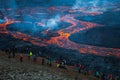 Lava flowing during volcanic eruption.