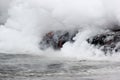 The lava glow of magma flowing in the ocean, Volcanic National Park Hawaii Royalty Free Stock Photo