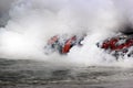 The lava glow of magma flowing in the ocean, Volcanic National Park Hawaii Royalty Free Stock Photo