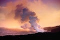 Lava pouring into the ocean creating a huge poisonous plume of smoke at Hawaii`s Kilauea Volcano, Volcanoes National Park, Hawaii Royalty Free Stock Photo