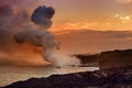 Lava pouring into the ocean creating a huge poisonous plume of smoke at Hawaii`s Kilauea Volcano, Volcanoes National Park, Hawaii Royalty Free Stock Photo