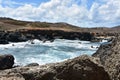 Lava Rock Cove Along the Sea Coast of Aruba Royalty Free Stock Photo