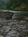 Lava rock river bank Royalty Free Stock Photo