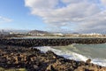 Lava rocks, rough sea and water waves at the coastline of Costa Teguise on Canary island Lanzarote