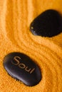 Lava stone with lettering Soul in sand Royalty Free Stock Photo