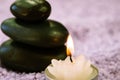 Lava stones and candle Royalty Free Stock Photo