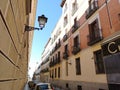 Lavapies neighborhood windows and balconies of Madrid city buildings facades