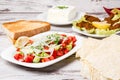 Lavas, Traditional Turkish Flat Bread and Salad on White Wooden Royalty Free Stock Photo