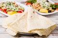 Lavas, Traditional Turkish Flat Bread and Salad on White Wooden Royalty Free Stock Photo