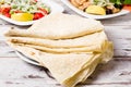 Lavas, Traditional Turkish Flat Bread and Salad on White Wooden Royalty Free Stock Photo