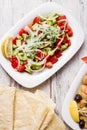 Lavas, Traditional Turkish Flat Bread and Salad on White Wooden Royalty Free Stock Photo