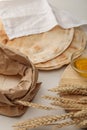 Bread covered with white towel near