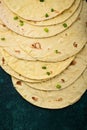 Lavash flat bread on green background Royalty Free Stock Photo