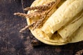 Lavash flat bread on green background Royalty Free Stock Photo