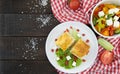 Lavash rolls with meet, vegetables and cheese served with green