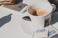 Lavazza cup of coffe and iPhone Royalty Free Stock Photo