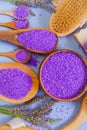 Lavender bath salt and body care brushes on a blue background. View from above.body cosmetic with lavender extract Royalty Free Stock Photo