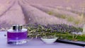Lavender bottle flower perfume in the field Royalty Free Stock Photo