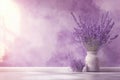 Lavender Bouquet in a Vase Against a Purple Wall Royalty Free Stock Photo