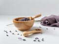 lavender buds and a wooden massage tool